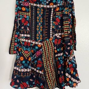 Floral size small romper from three days